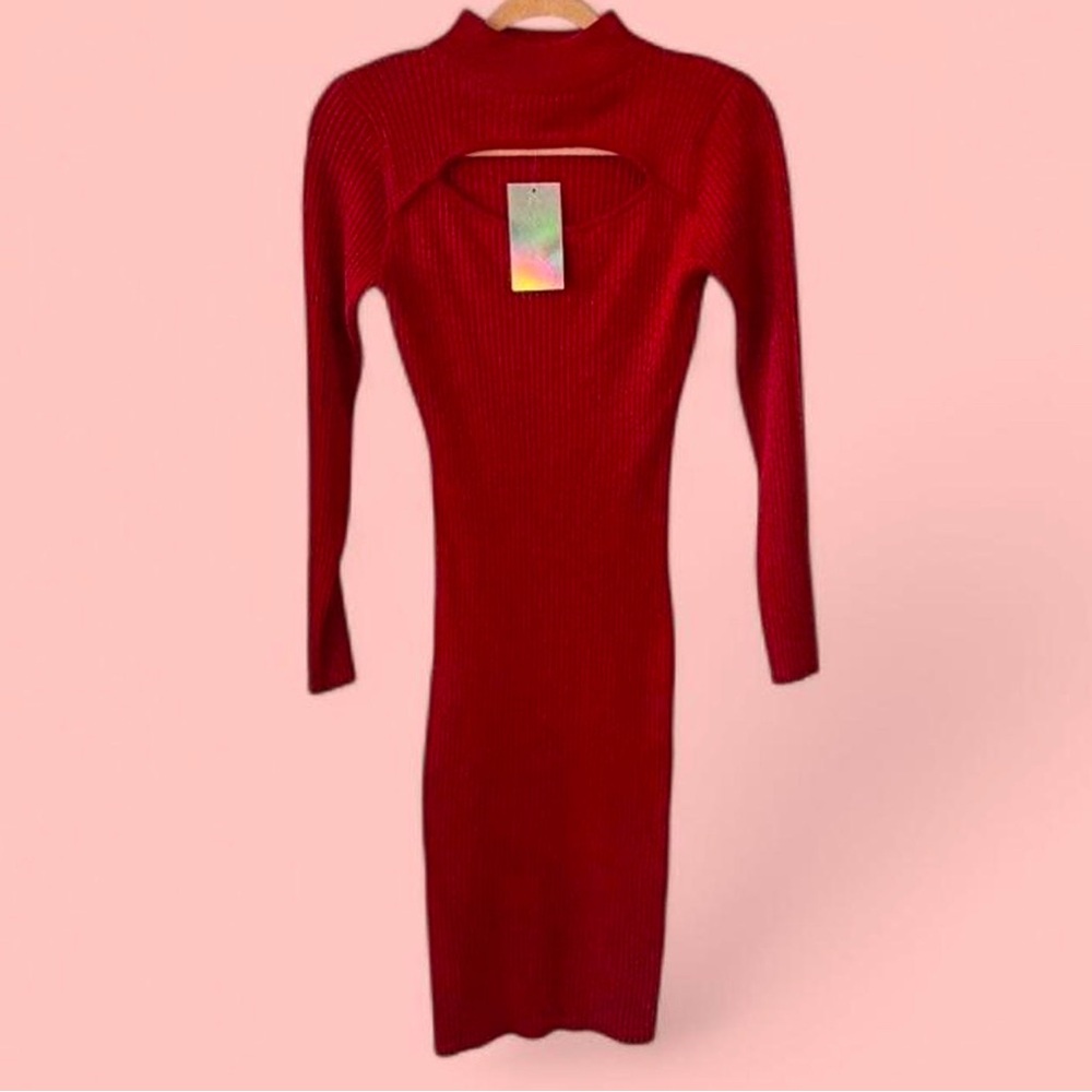 Red ribbed bodycon dress with cut out detail. Size Medium.